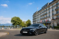 Drop-off at The Ritz-Carlton Hotel de la Paix - Book a transfer in a Mercedes-Benz E-Class